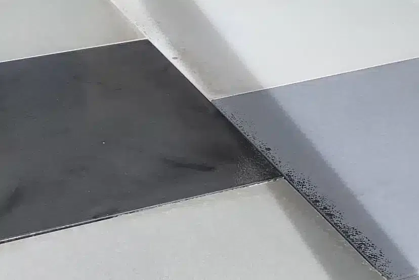 Professional paver sealing using penetrating sealers for a wet look that enhances the colour and shine of concrete pavers.