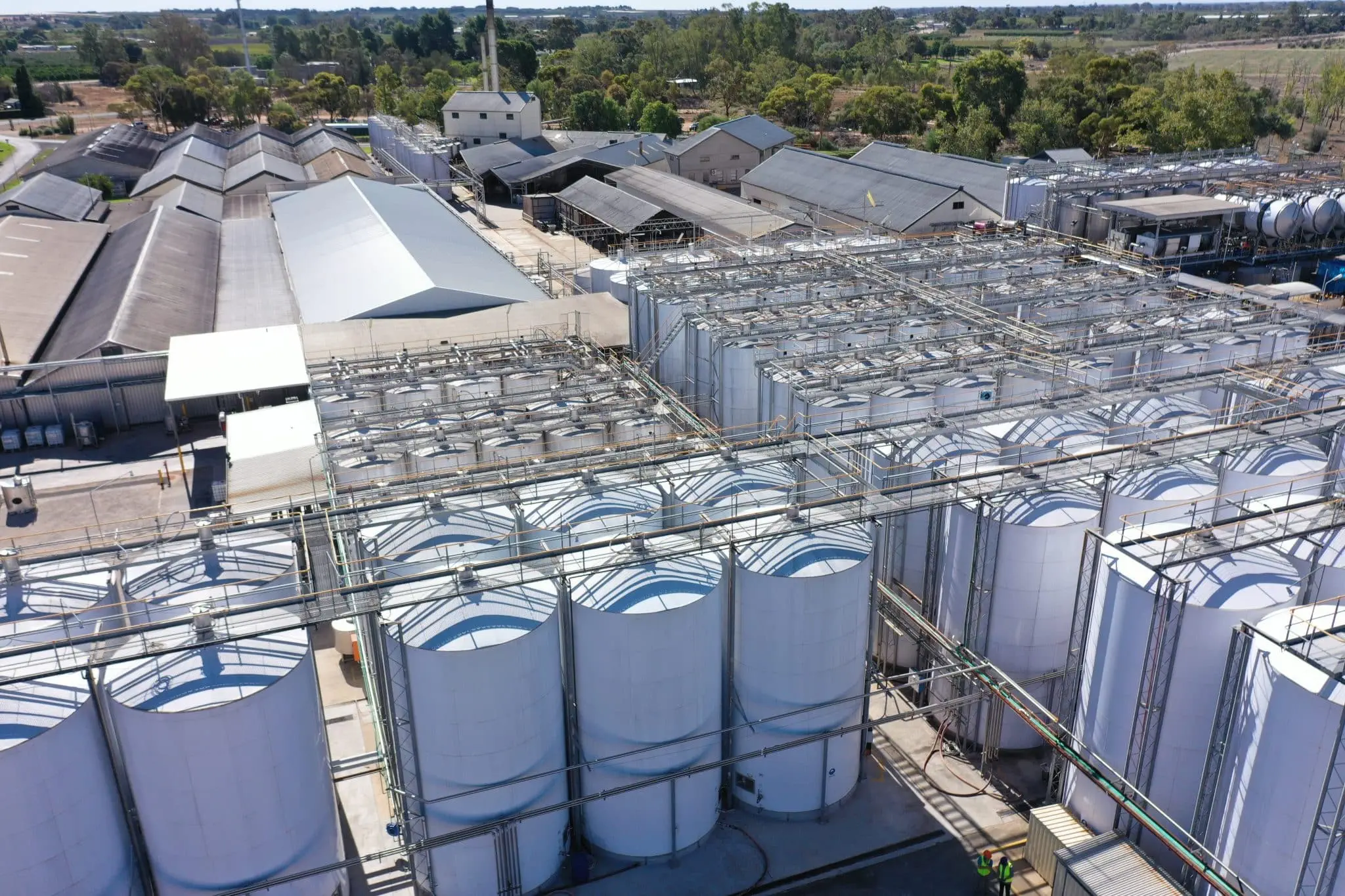 Overview of winery tanks and equipment being prepared for cleaning