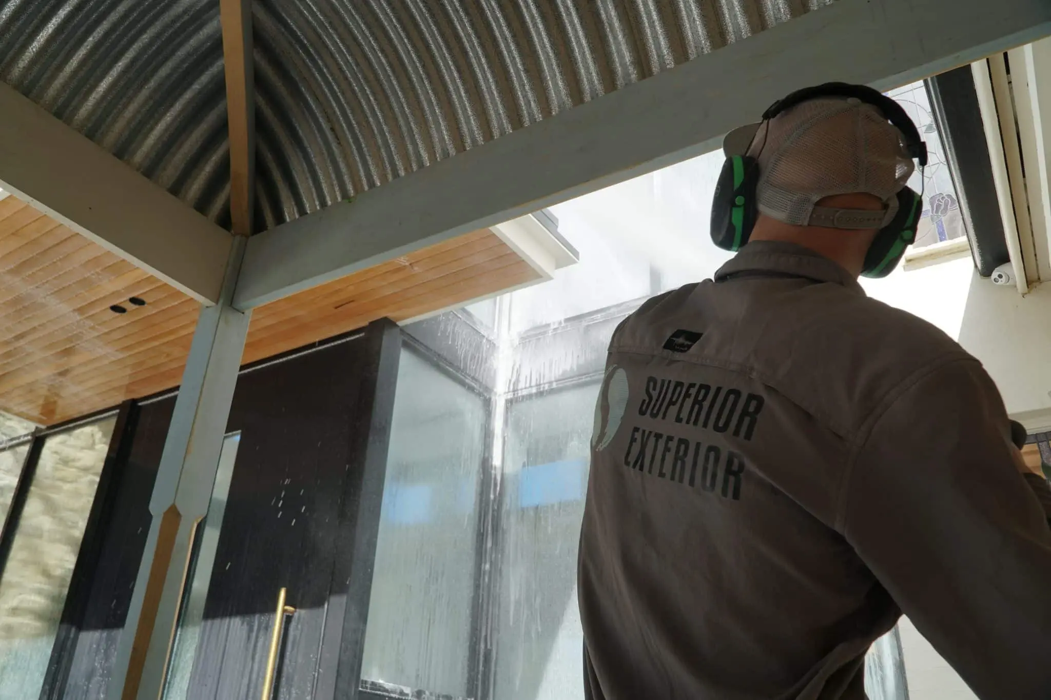 Professional house washing Adelaide with high-pressure cleaning on a modern home's exterior.