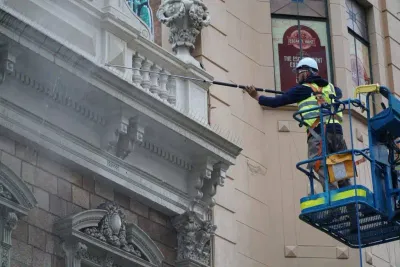 Commercial pressure cleaning services on a building exterior.